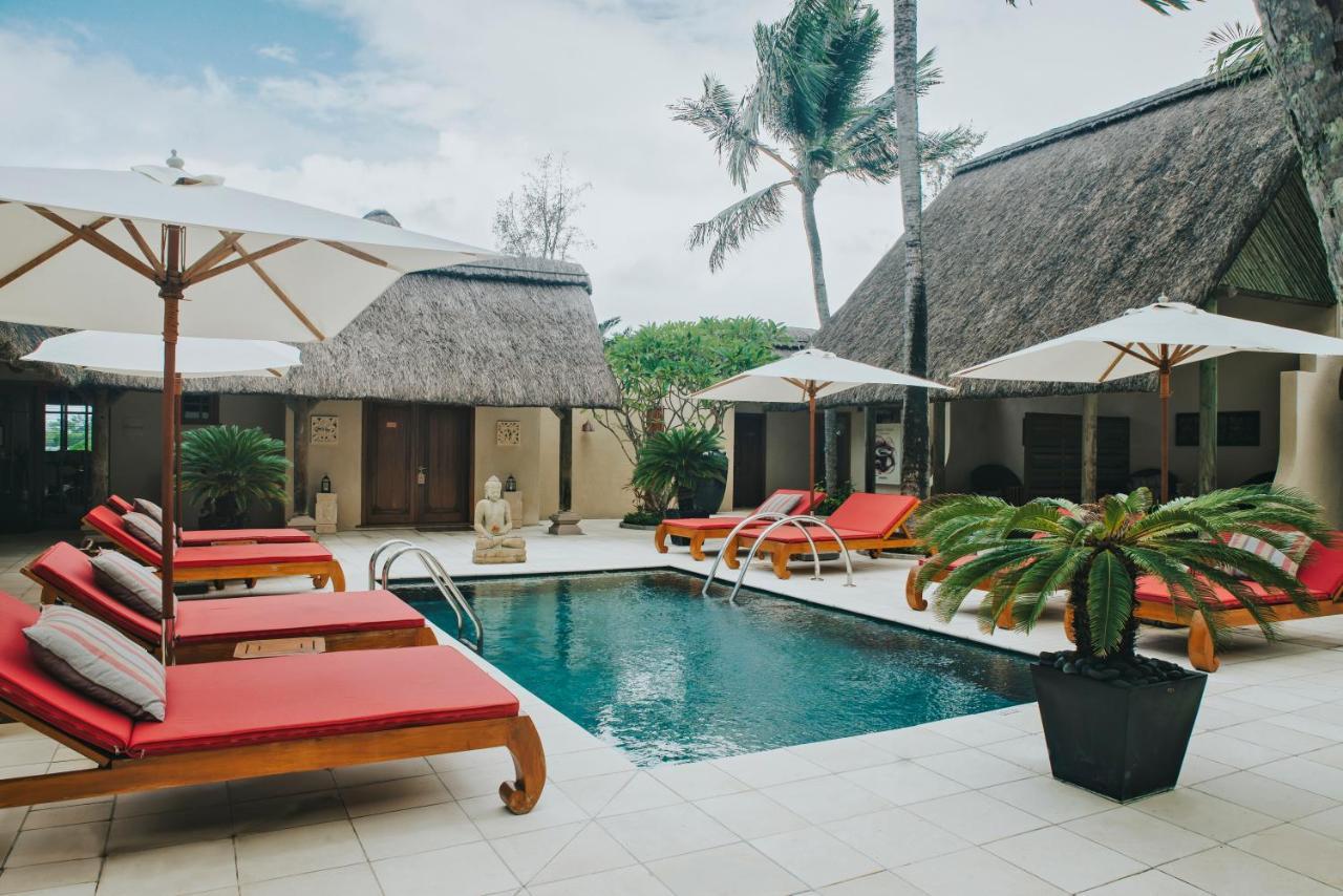Constance Prince Maurice Poste de Flacq Esterno foto The swimming pool at the resort