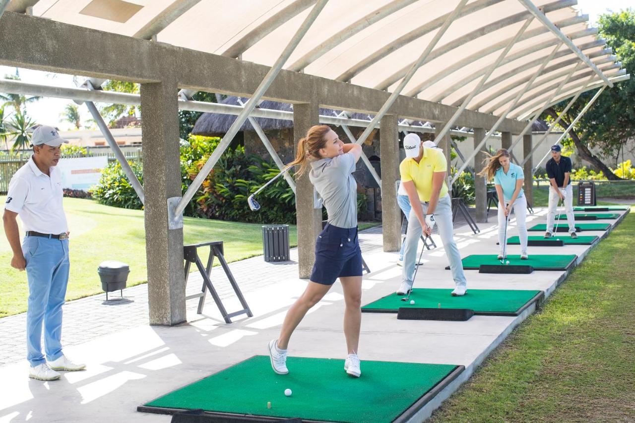 Constance Prince Maurice Poste de Flacq Esterno foto Golfers practicing at a driving range