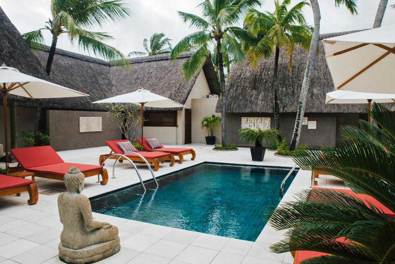 Constance Prince Maurice Poste de Flacq Esterno foto A pool at the resort